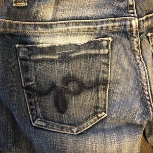 Guess jeans with dark blue and light wash.